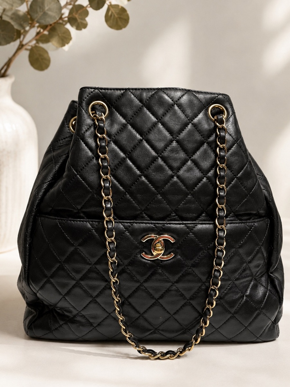 Auth. CHANEL Black Quilted Lambskin Drawstring Bucket Bag Gold Chain Crossbody